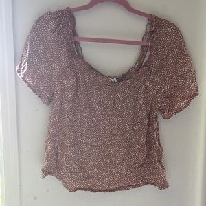 Tan and white blouse in size medium.